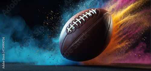 Obraz na płótnie Banner. Dynamic shot of American Football ball flying from colorful dust in motion against black background with negative space to insert text w salonie