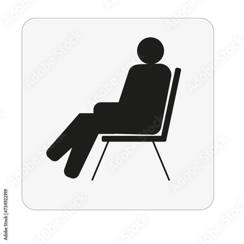 Silhouette d'une personne assise sur une chaise indiquant une salle de repos