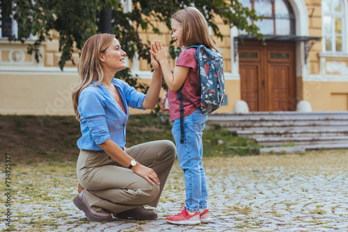 Valokuva Mother taking her daughter to school