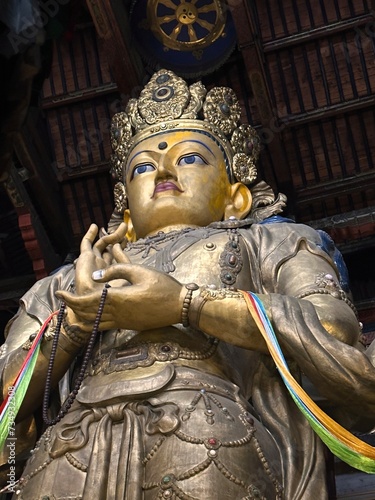 Gold Buddha statue at Gandantegchinlen Monastery in Ulaanbaatar Mongolia