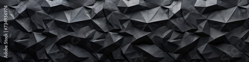 wall with a rubber-like texture in black, featuring polygonal bumps.