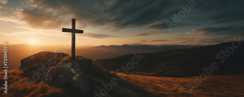 Christian cross banner of a wooden cross on hilltop with copy space