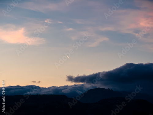 blue hour over mountains silhouette