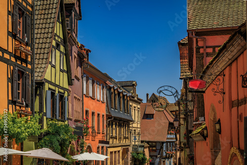 Traditional colorful half timbered houses in a popular village on the Alsatian Wine Route in Riquewihr, France © SvetlanaSF