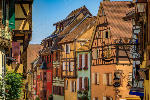 Traditional colorful half timbered houses in a popular village on the Alsatian Wine Route in Riquewihr, France
