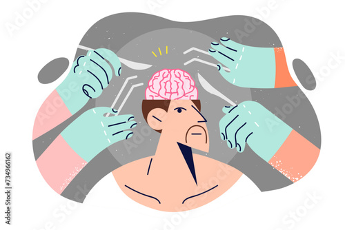Man undergoing brain surgery to remove malignant tumor, stands among hands with surgical instruments