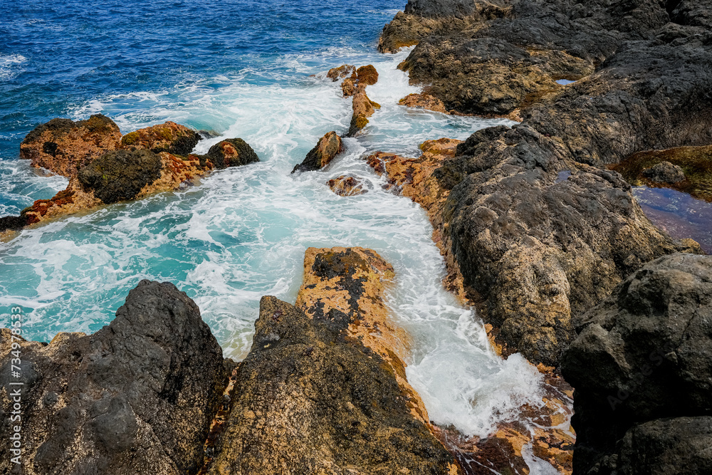 Beautiful rocks and turquoise sea on the coast of the Canary Islands, Tenerife Spain