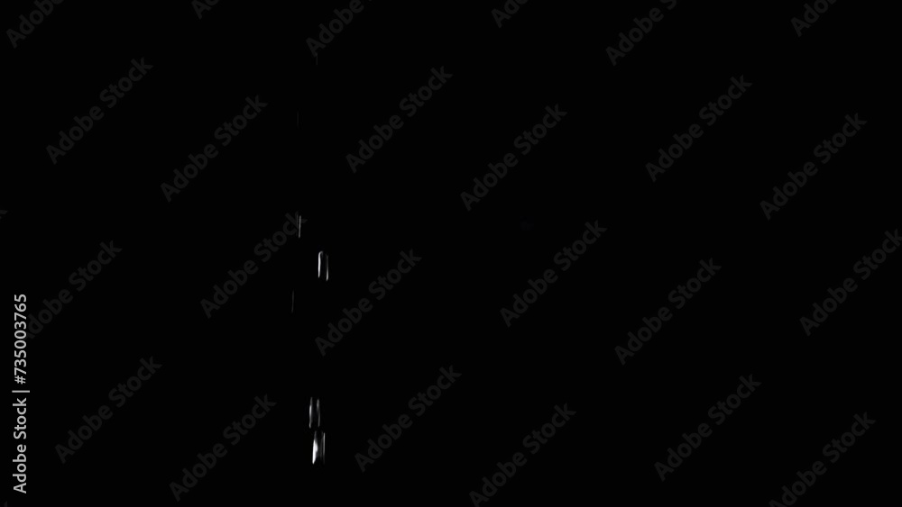 Transparent Drops of Water Fall with Splashes on an Empty Black Background. Side view. Splash, a spray of clean water drops like a diamond. Texture. Copy space. Close up. Isolated. Slow motion.