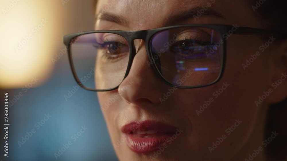 Close up shot of nervous business lady control the stocks market updates in eyeglasses reflection. Professional trader analyzing graphics changes. Stocks market financial analytic Close up shot of nervous business lady control the stocks market updates in eyeglasses reflection. Professional trader analyzing graphics changes. Stocks market financial analytic