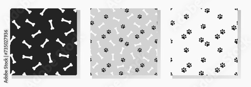 Black domestic pet's paws prints and white bones. Vector seamless patterns collection.