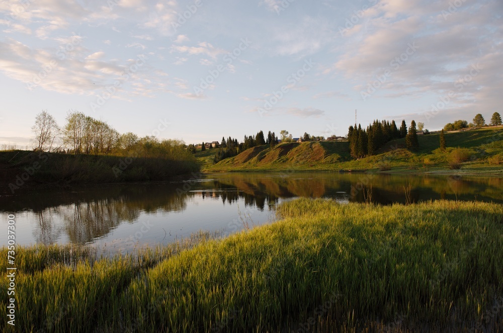 river reflection blue sky green grass hill river reflection blue sky green grass hill