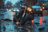 A motorcycle collided with a car on a rainy street