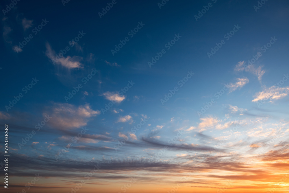 Sunset and sunrise sky. Orange, blue and yellow colors sunset. Panoramic view.