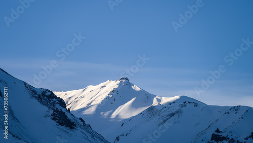beautiful snowy mountain peaks. snow cliffs. winter in the mountains © Daniil_98_03_09