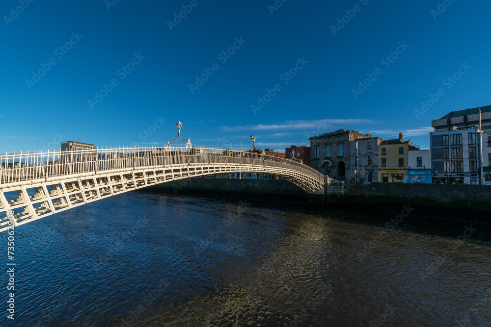 Dublin, Ireland  Ha'penny Bridge Dublin at dusk over the river Liffey