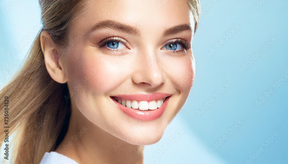 Dental care and health.Woman smile.Correct healthy care of white teeth with clean skin and make-up, beautiful female face, blue eye,pure beauty,light blue background.