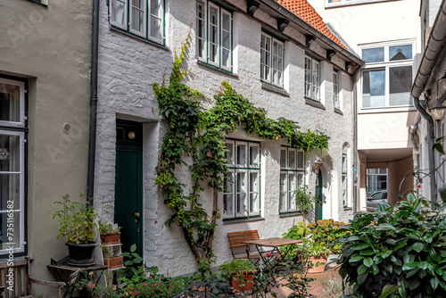 Old town in the hanseatic city of L  beck with historic buildings