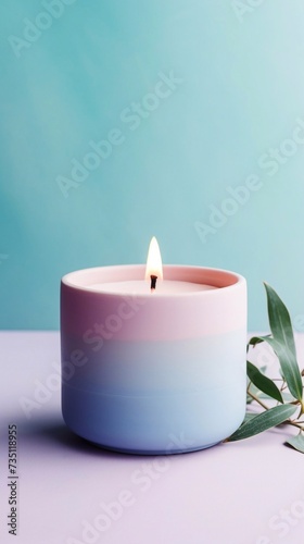  Handmade olive wax different forms blue color candle on a duotone pastel pink and white background. Sustainability vegan candle  natural materials. Minimalistic  modern photo. Copy space. Horizontal.