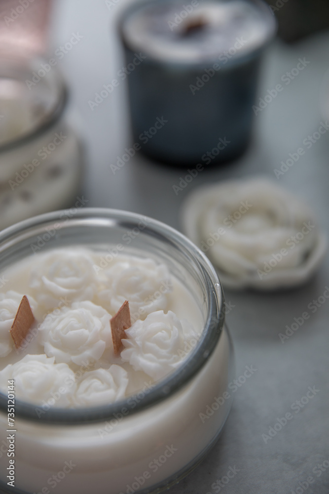 Candles with lavender and flowers in the interior Candles with lavender and flowers in the interior