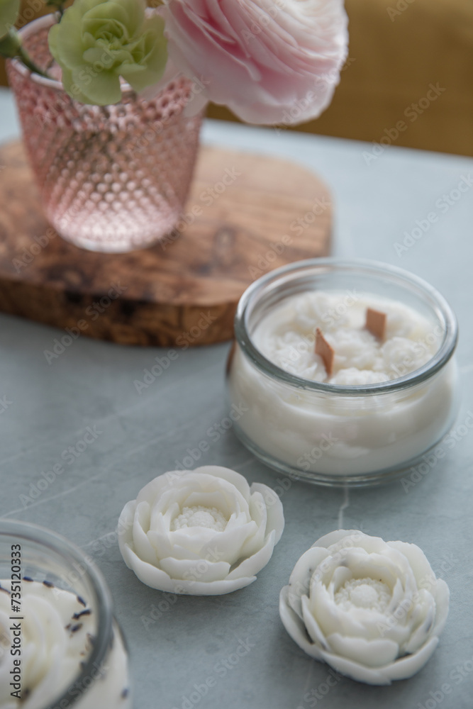 Candles with lavender and flowers in the interior