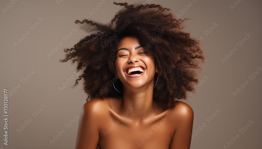 A happy black female laughing on a neutral background evoking a sense of playfulness A happy black female laughing on a neutral background evoking a sense of playfulness