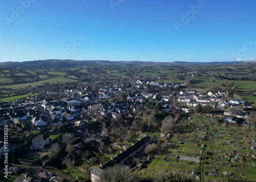 Moretonhampstead, Dartmoor, Devon, England: DRONE VIEWS: The drone flies over the medieval town showing its church, houses & allotments. The town was mentioned in the Domesday Book of 1086AD (Clip 6). photo