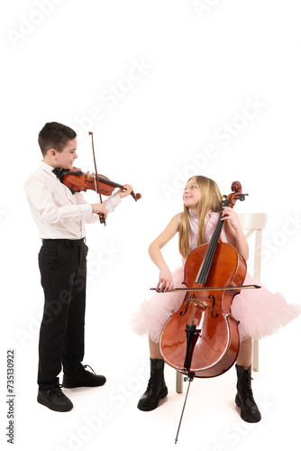 Boy and girl playing violin and cello