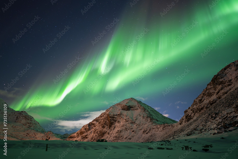 nord sea and mountains from lofoten with aurora borealis