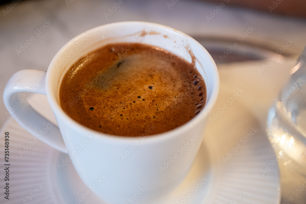 Turkish coffee in white cup Turkish coffee in white cup