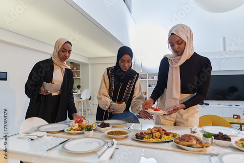 Group of young Arab women come together to lovingly prepare an iftar table during the sacred Muslim month of Ramadan  embodying the essence of communal unity  cultural tradition  and joyous