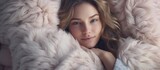 Young woman relaxing with chunky merino wool blanket Relax comfort lifestyle Winter style. Creative Banner. Copyspace image