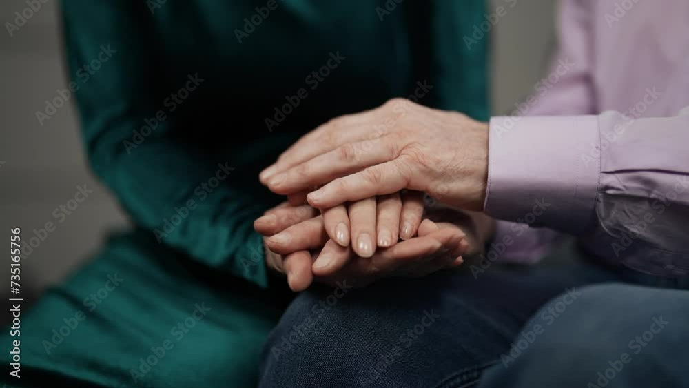 Senior woman stroking man hands. Tender gentle mature wife supporting husband caring in stress situation, hands close-up. Old family couple holding hands. Care love lifelong relationship concept. Senior woman stroking man hands. Tender gentle mature wife supporting husband caring in stress situation, hands close-up. Old family couple holding hands. Care love lifelong relationship concept.