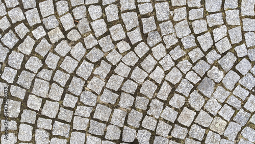 Cobblestone pavement texture background. Cobblestone pavement background.