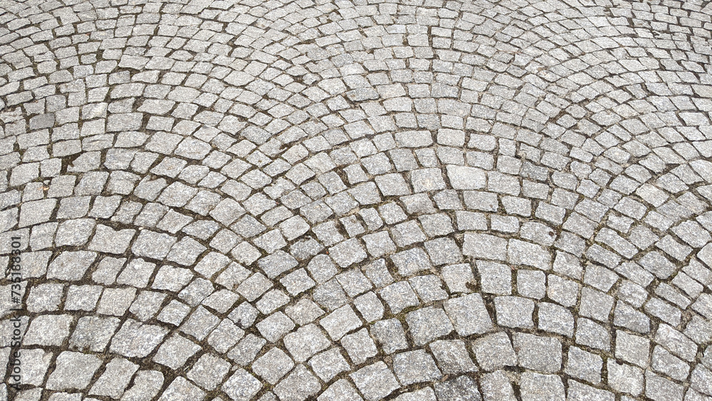Cobblestone pavement texture background. Cobblestone pavement background.
