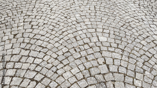 Cobblestone pavement texture background. Cobblestone pavement background.