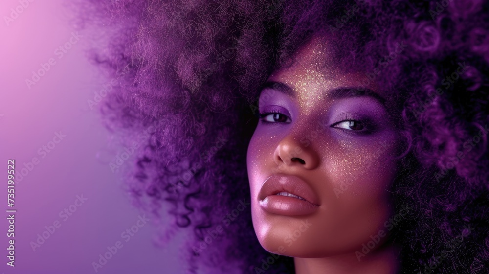 Woman with voluminous curly afro hairstyle on purple background
