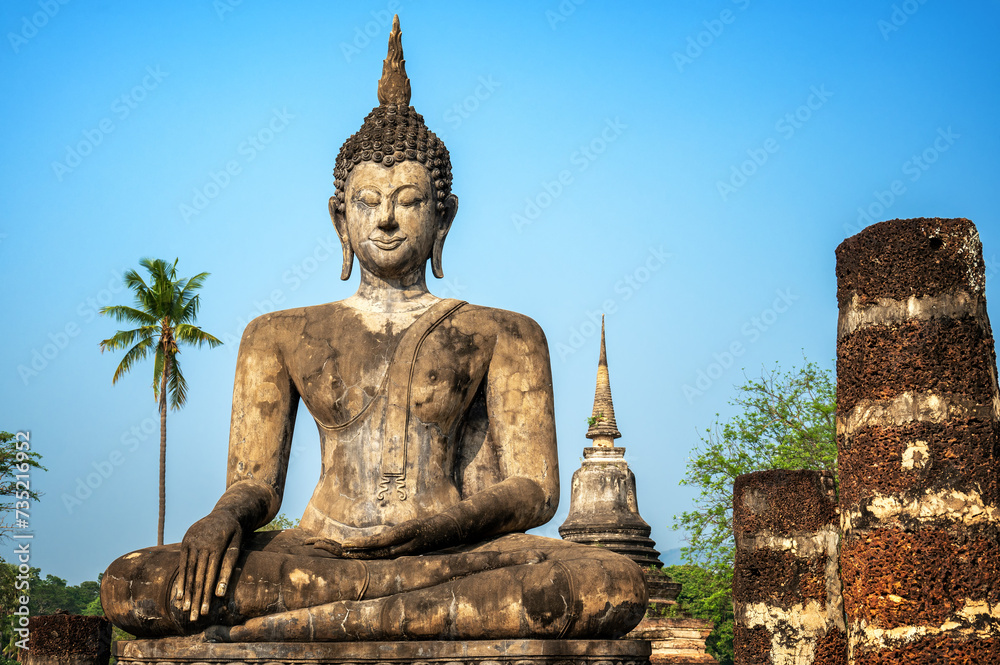 Fototapeta premium View of a statue of Buddha in Wat Mahathat in Sukhothai, Thailand