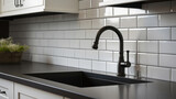 Modern kitchen sink with stainless steel faucet with mixer tap in modern kitchen with window. Copy space