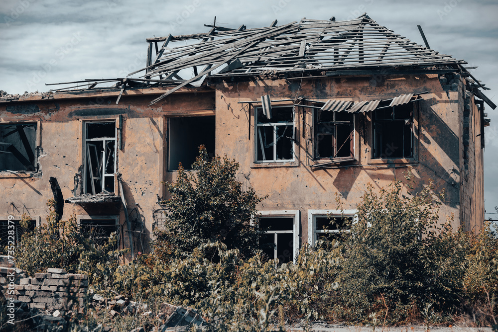 destroyed houses in an abandoned city without people in Ukraine destroyed houses in an abandoned city without people in Ukraine