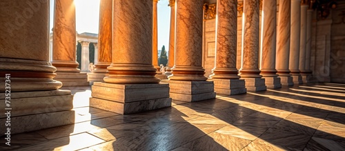 Marble pillars building detail with sunshine photo