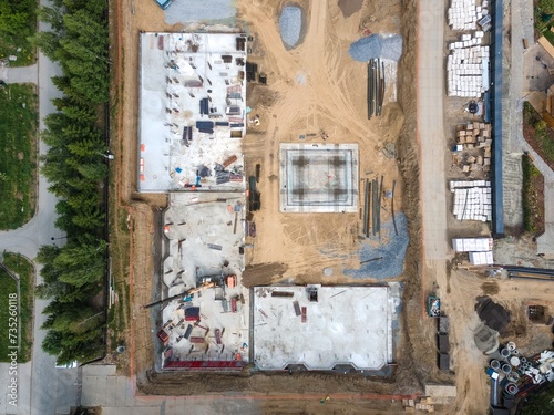 Photography the construction site of an apartment building in the summer from a height