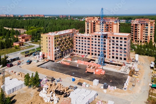 Photography the construction site of an apartment building in the summer from a height