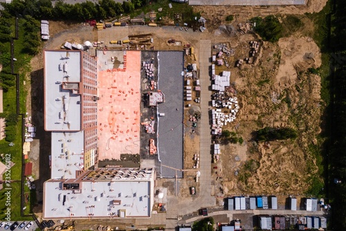 Photography the construction site of an apartment building in the summer from a height