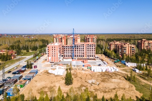 Photography the construction site of an apartment building in the summer from a height