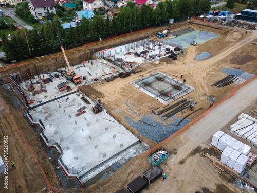 Photography the construction site of an apartment building in the summer from a height