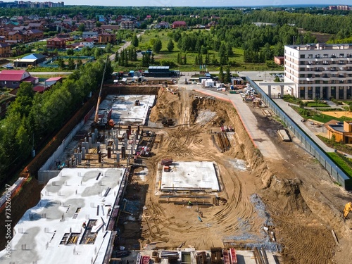 Photography the construction site of an apartment building in the summer from a height