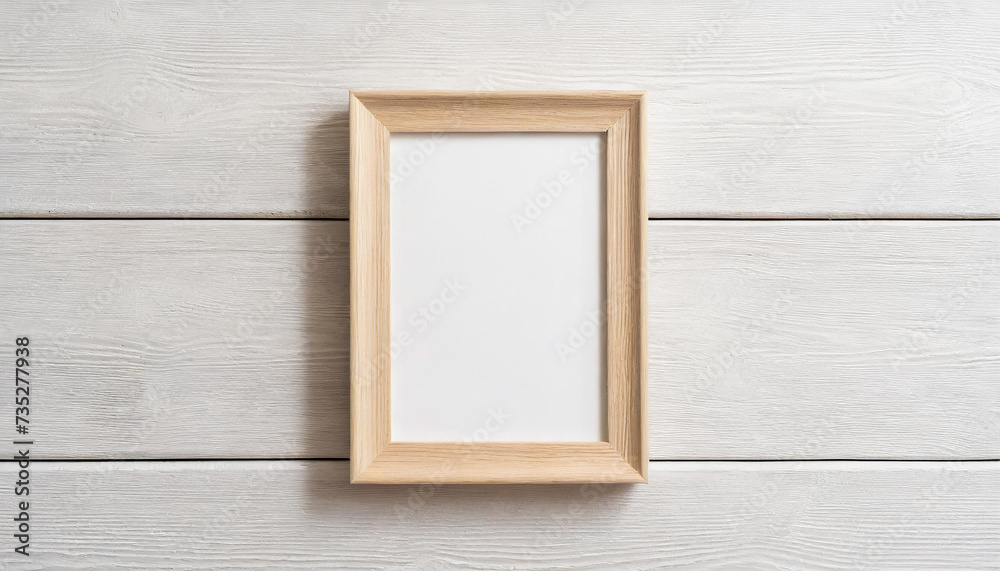 One light wood thin rectangular vertical frame hanging on a white textured wall mockup, Flat lay, top view, 3D illustration One light wood thin rectangular vertical frame hanging on a white textured wall mockup, Flat lay, top view, 3D illustration