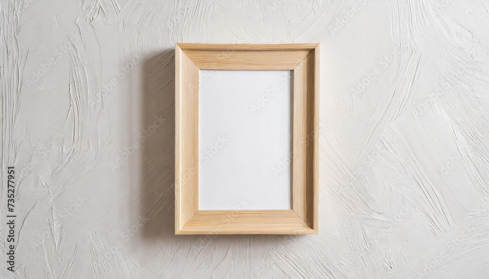 One light wood thin rectangular vertical frame hanging on a white textured wall mockup, Flat lay, top view, 3D illustration One light wood thin rectangular vertical frame hanging on a white textured wall mockup, Flat lay, top view, 3D illustration