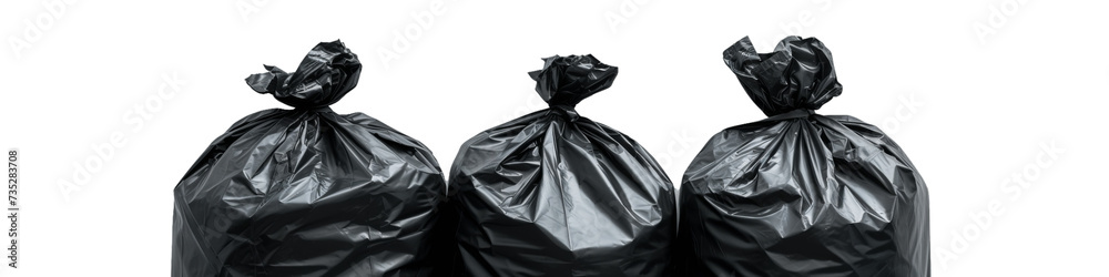 Three Black Garbage Bags Arranged Neatly for Urban Waste Management