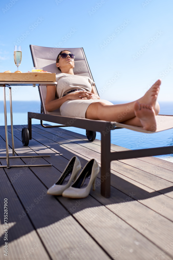 Relax, pool and woman in chair with champagne, brunch and business trip with hotel service. Travel, hospitality and businesswoman with drink, lunch and sunshine at luxury villa for summer holiday.